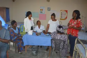 Health workers meet with patients during the KMJ Foundation medical outreach in Abia State