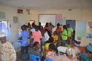 Community members wait to be seen at the KMJ Foundation medical outreach