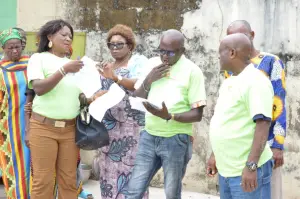KMJ Foundation team reviews the recipient list during the 2023 distribution